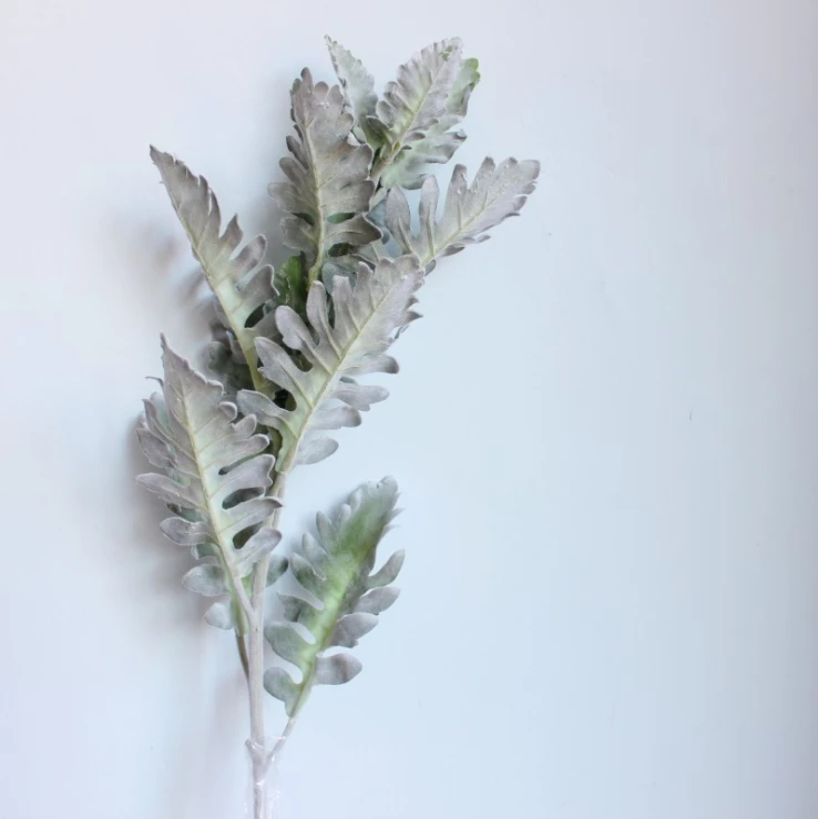 Pale grey-green artificial foliage with a textured flocked surface